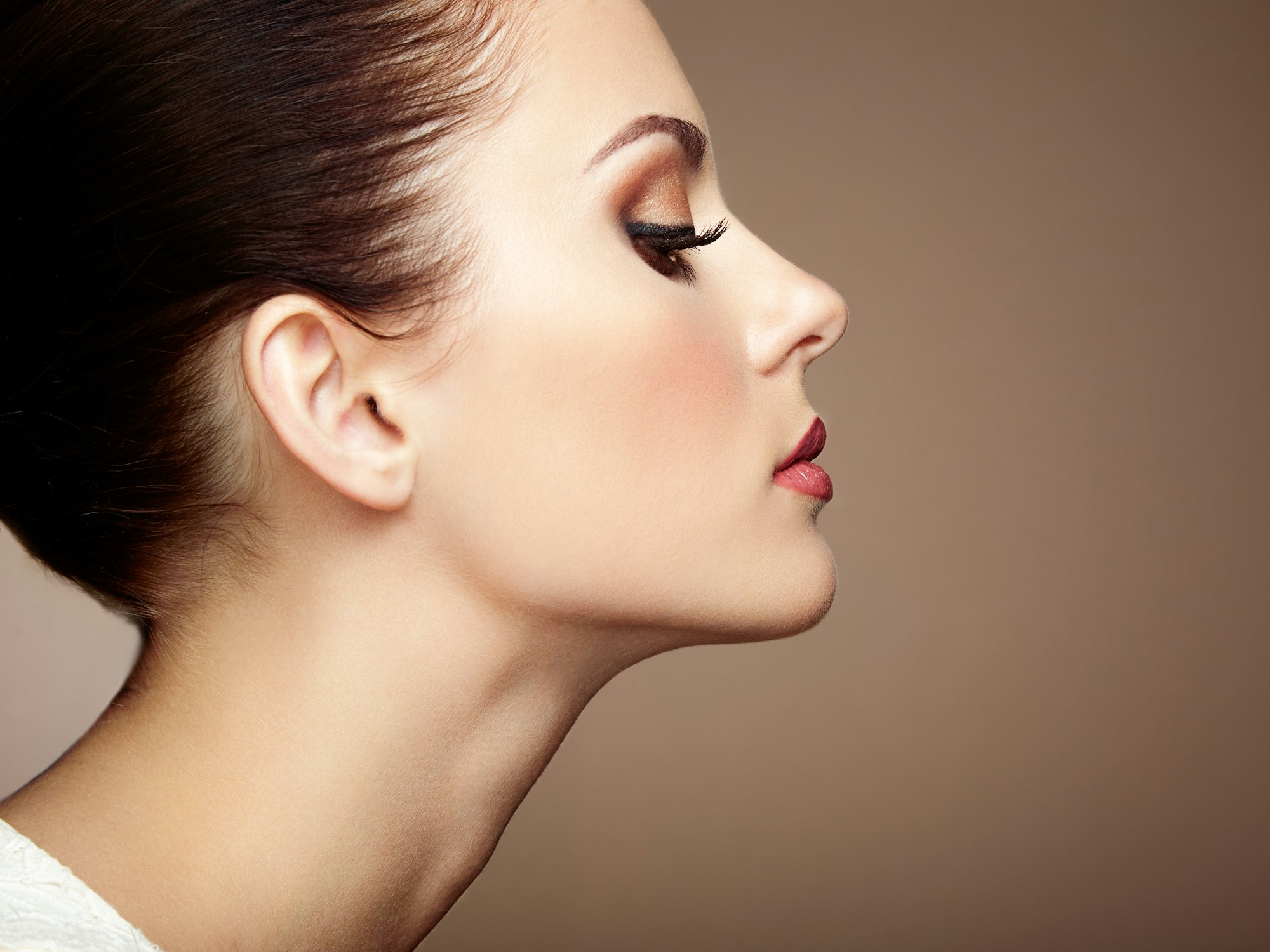 Beautiful woman face. Perfect makeup Beautiful woman face. Perfect makeup